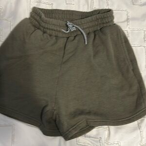 Green loose shorts